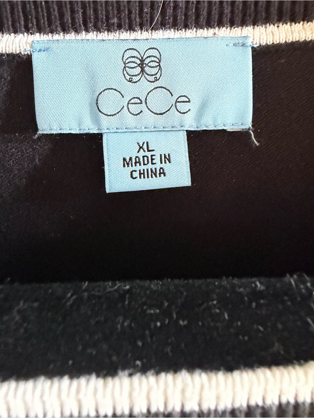 CeCe Black Short-Sleeve Knit Top with White Trim and Bow Accent - Picture 2 of 4
